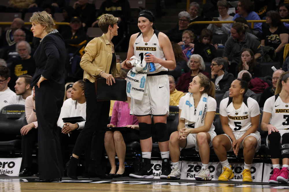 Associate head coach Jan Jensen and forward Megan Gustafson (10) against the Illinois Fighting Illini Thursday, February 14, 2019 at Carver-Hawkeye Arena. (Brian Ray/hawkeyesports.com)