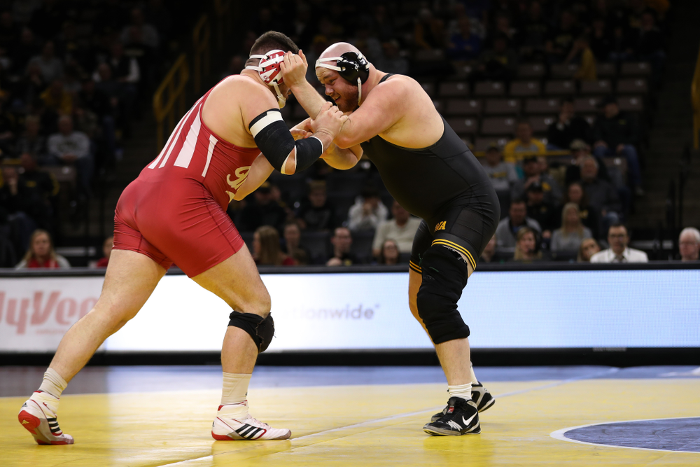 Iowa's Sam Stoll wrestles Indiana's Fletcher Miller at heavyweight Friday, February 15, 2019 at Carver-Hawkeye Arena. (Brian Ray/hawkeyesports.com)