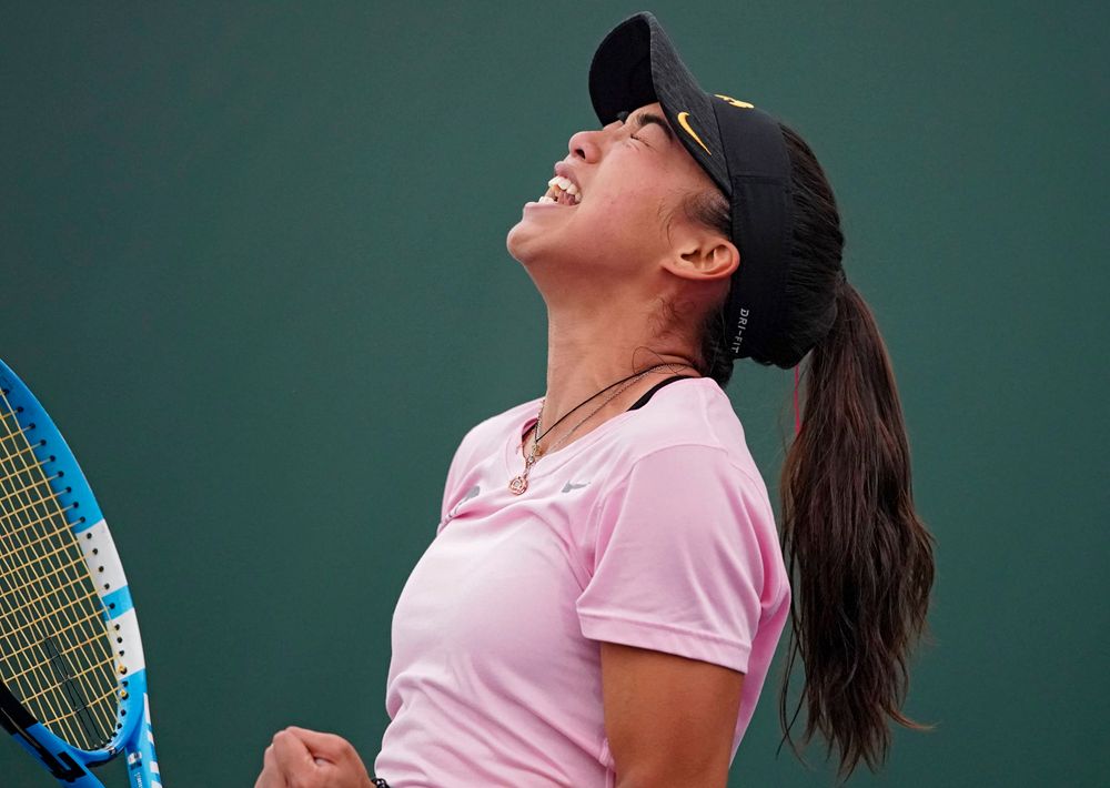 Iowa's Michelle Bacalla celebrates after winning her match against Purdue at the Hawkeye Tennis and Recreation Complex in Iowa City on Friday, Mar. 29, 2019. (Stephen Mally/hawkeyesports.com)