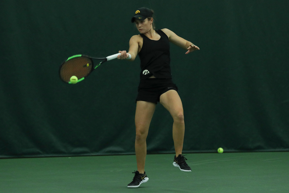 Iowa’s Elise van Heuvelen during the Iowa women’s tennis meet vs DePaul on Friday, February 21, 2020 at the Hawkeye Tennis and Recreation Complex. (Lily Smith/hawkeyesports.com)