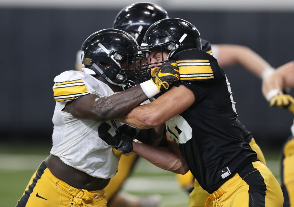 Iowa Hawkeyes linebacker Amani Jones (52) anduring Fall Camp Practice No. 6 Thursday, August 8, 2019 at the Ronald D. and Margaret L. Kenyon Football Practice Facility. (Brian Ray/hawkeyesports.com)