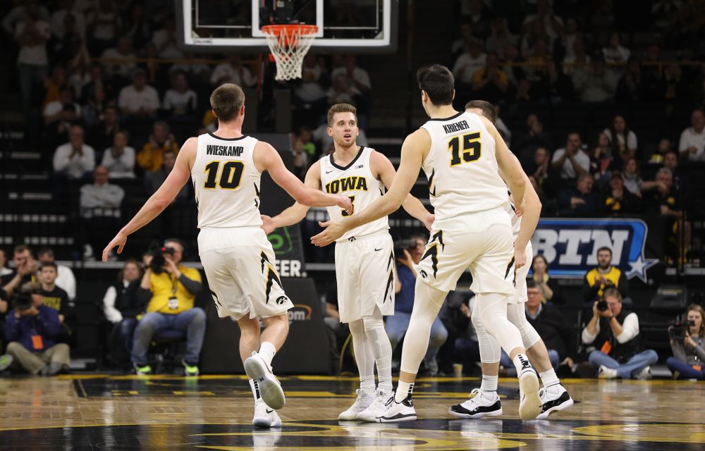 Iowa Hawkeyes guard Joe Wieskamp (10), guard Jordan Bohannon (3), and forward Ryan Kriener (15) against the Illinois Fighting Illini Sunday, January 20, 2019 at Carver-Hawkeye Arena. (Brian Ray/hawkeyesports.com)