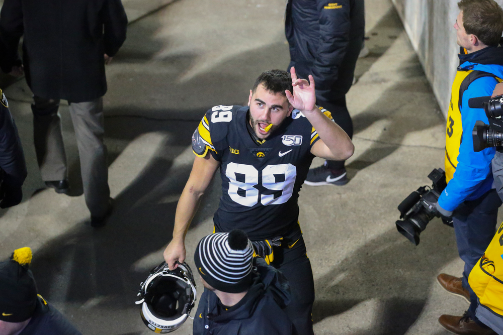 Iowa Hawkeyes wide receiver Nico Ragaini (89) waves to fans after Iowa football vs Minnesota on Saturday, November 16, 2019 at Kinnick Stadium. (Lily Smith/hawkeyesports.com)