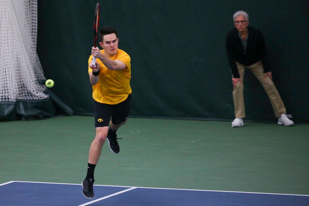 Iowa's Jonas Larsen at a tennis match vs Drake Friday, March 8, 2019 at the Hawkeye Tennis and Recreation Complex. (Lily Smith/hawkeyesports.com)