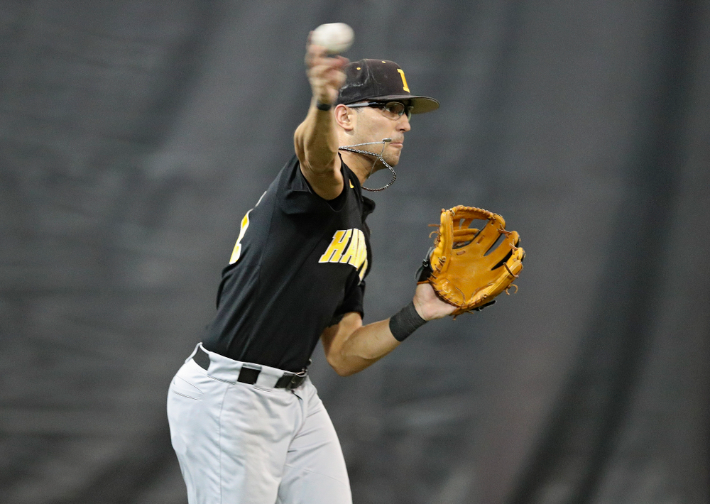 Iowa Hawkeyes infielder Matthew Sosa (31) throws to first base during practice at the Hansen Football Performance Center in Iowa City on Friday, January 24, 2020. (Stephen Mally/hawkeyesports.com)