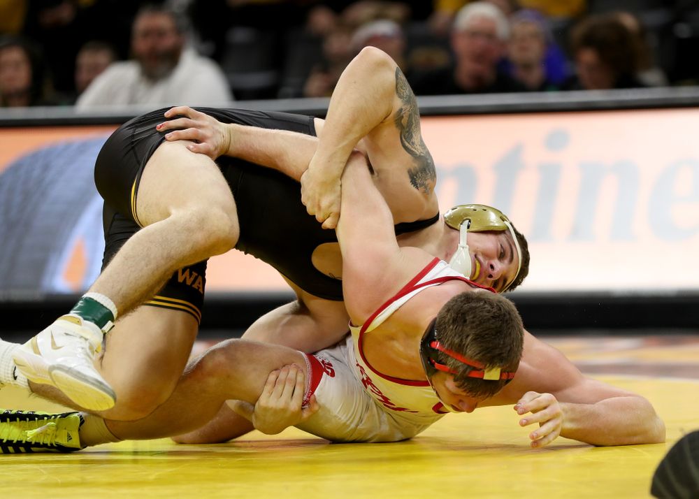 Iowa’s Abe Assad wrestles Nebraska’s Taylor Venz at 184 pounds Saturday, January 18, 2020 at Carver-Hawkeye Arena. Assad won the match 6-4. (Brian Ray/hawkeyesports.com)