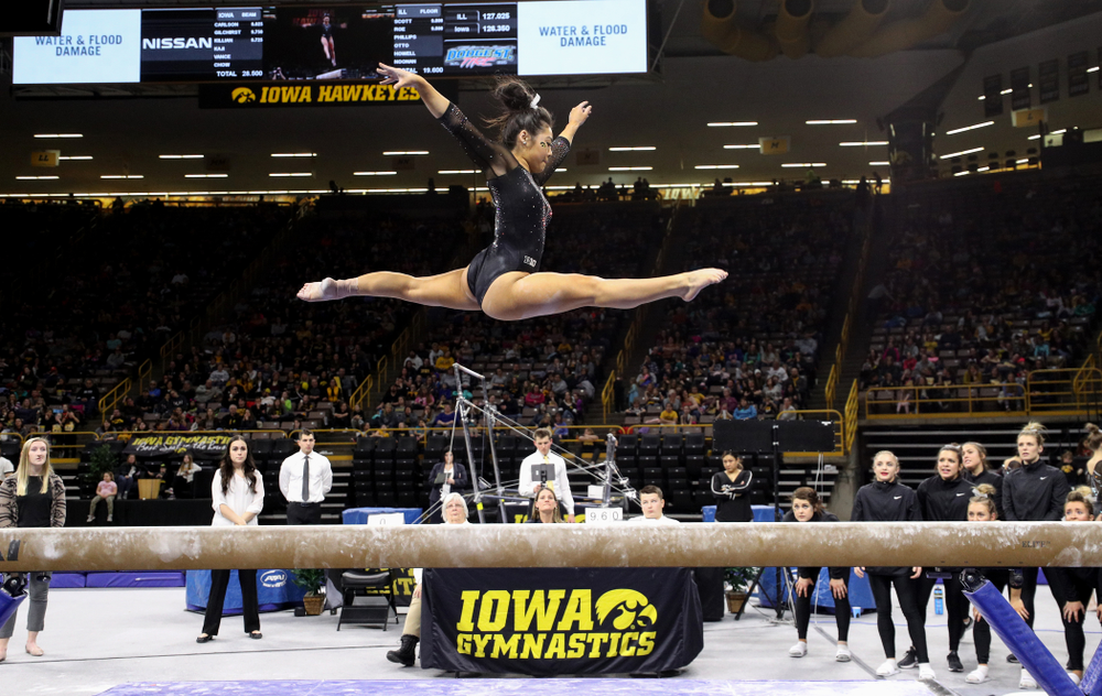 Iowa's Clair Kaji competes on the beem against Illinois Saturday, February 16, 2019 at Carver-Hawkeye Arena. (Brian Ray/hawkeyesports.com)