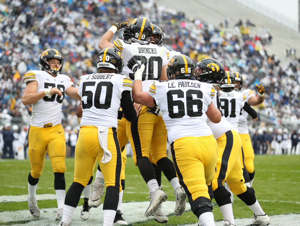 Iowa Hawkeyes defensive end Sam Brincks (90) catches a touchdown pass against the Penn State Nittany Lions Saturday, October 27, 2018 at Beaver Stadium in University Park, Pa. (Max Allen/hawkeyesports.com)