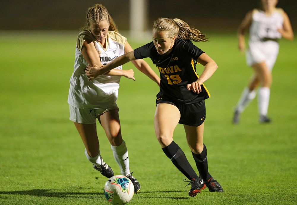 Iowa forward Jenny Cape (19) sprints towards the ball during the second half of their match against Western Michigan at the Iowa Soccer Complex in Iowa City on Thursday, Aug 22, 2019. (Stephen Mally/hawkeyesports.com)