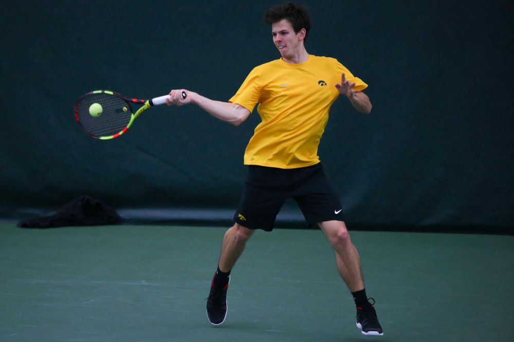 Iowa's Joe Tyler at a tennis match vs Drake Friday, March 8, 2019 at the Hawkeye Tennis and Recreation Complex. (Lily Smith/hawkeyesports.com)