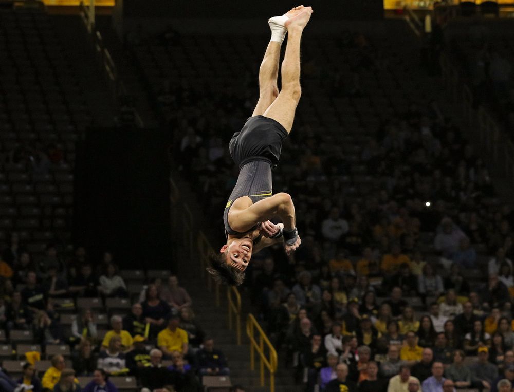 Iowa's Andrew Herrador competes in the floor during the first day of the Big Ten Men's Gymnastics Championships at Carver-Hawkeye Arena in Iowa City on Friday, Apr. 5, 2019. (Stephen Mally/hawkeyesports.com)