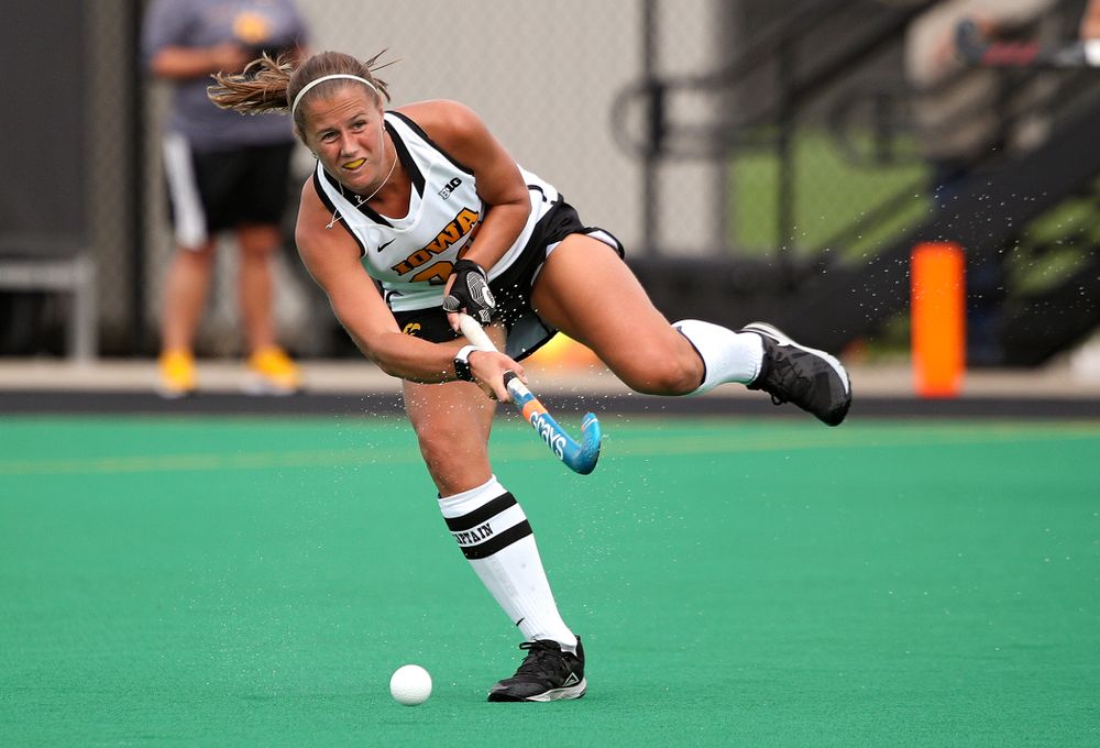 Iowa’s Sophie Sunderland (20) passes during the first quarter of their game at Grant Field in Iowa City on Friday, Sep 13, 2019. (Stephen Mally/hawkeyesports.com)