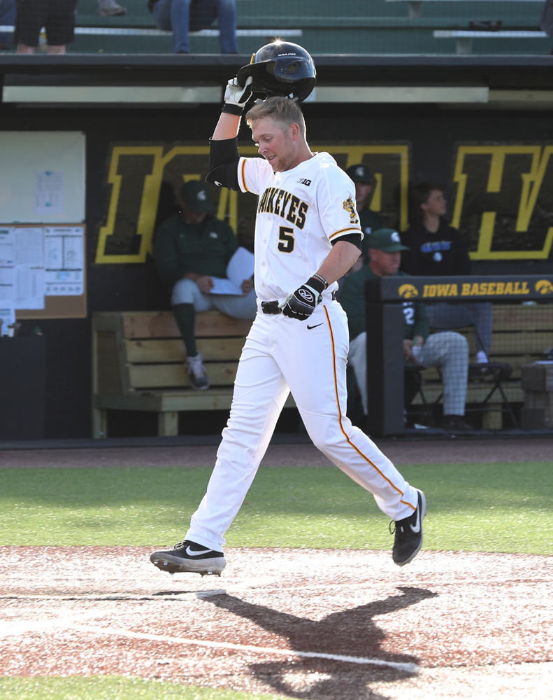 Iowa Hawkeyes Zeb Adreon (5) celebrates a grand slam against the Michigan State Spartans Friday, May 10, 2019 at Duane Banks Field. (Brian Ray/hawkeyesports.com)