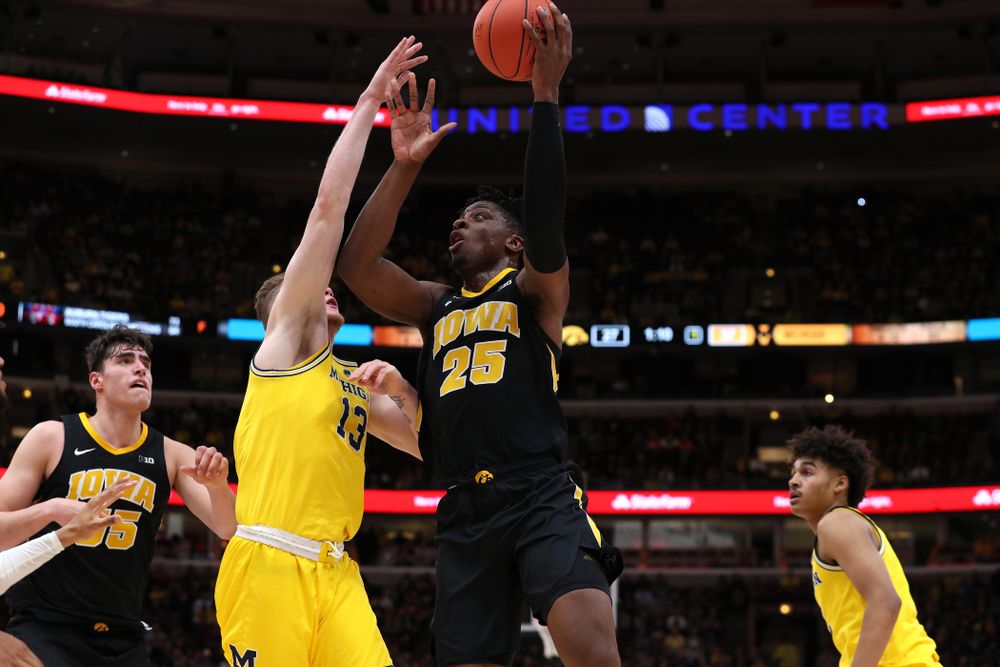 Iowa Hawkeyes forward Tyler Cook (25) against the Michigan Wolverines in the 2019 Big Ten Men's Basketball Tournament Friday, March 15, 2019 at the United Center in Chicago. (Brian Ray/hawkeyesports.com)