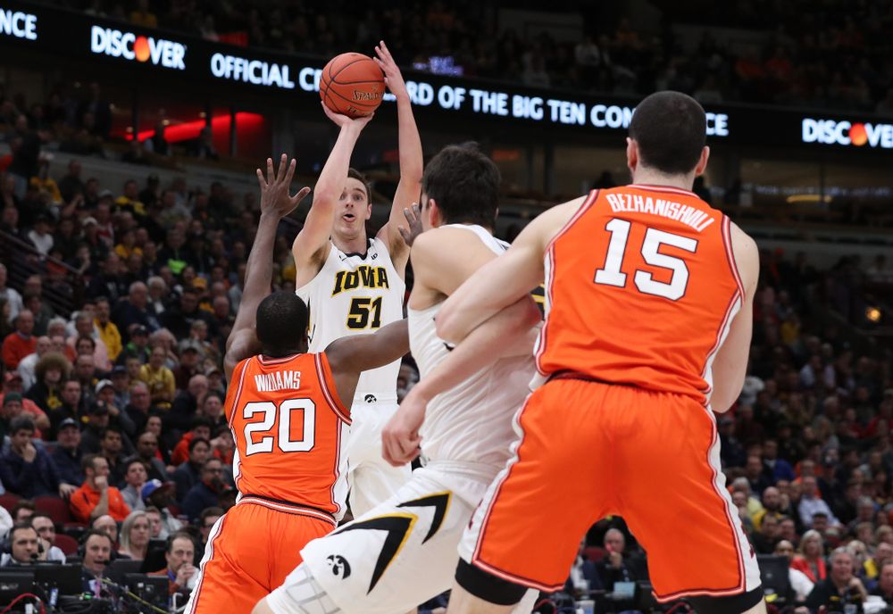 Iowa Hawkeyes forward Nicholas Baer (51) against the Illinois Fighting Illini in the 2019 Big Ten Men's Basketball Tournament Thursday, March 14, 2019 at the United Center in Chicago. (Brian Ray/hawkeyesports.com)