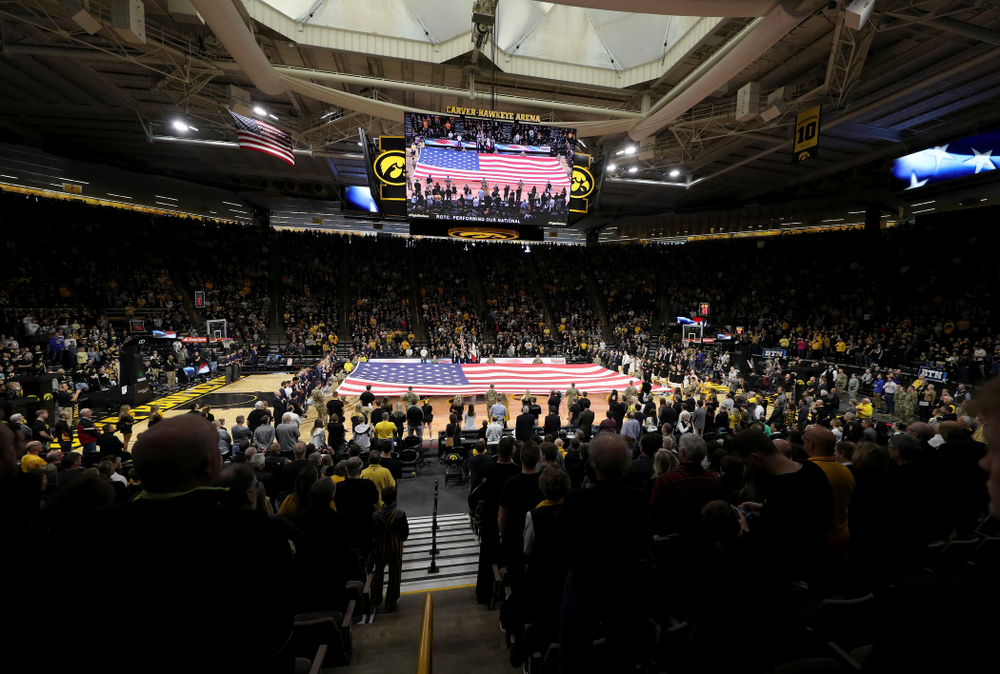 Members of the Iowa Army ROTC display a large American flag before the Iowa Hawkeyes game against Penn State Saturday, February 29, 2020 at Carver-Hawkeye Arena. (Brian Ray/hawkeyesports.com)