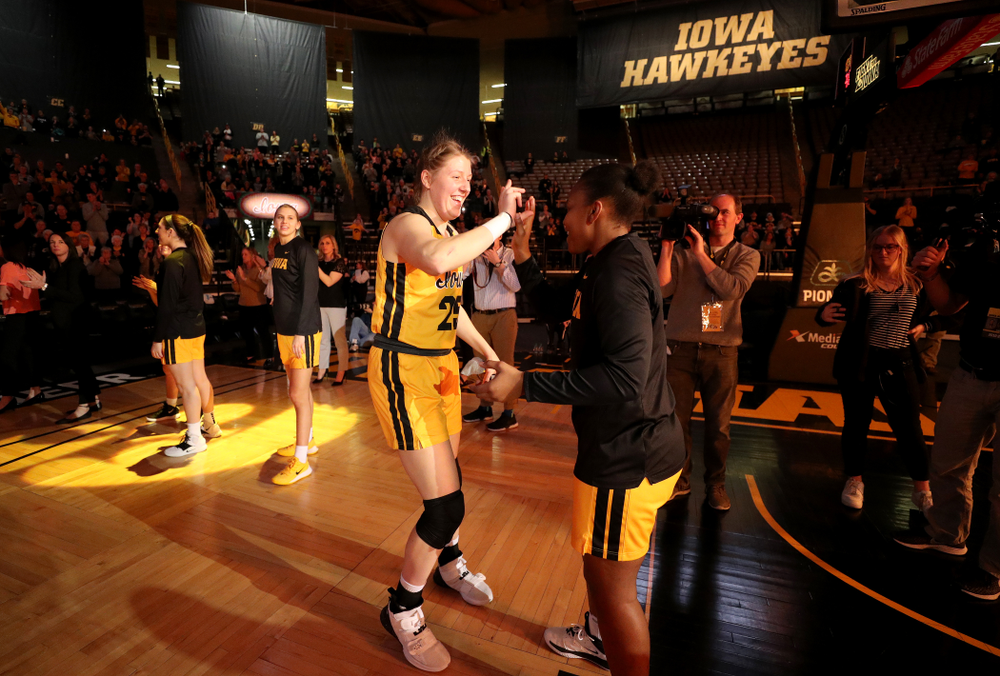 Iowa Hawkeyes forward/center Monika Czinano (25) and guard Zion Sanders (21) against the Minnesota Golden Gophers Thursday, February 27, 2020 at Carver-Hawkeye Arena. (Brian Ray/hawkeyesports.com)