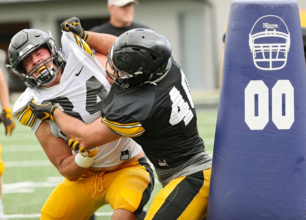 Iowa Hawkeyes linebacker Kristian Welch (34) and fullback Turner Pallissard (40) run a drill during Fall Camp Practice No. 10 at the Hansen Football Performance Center in Iowa City on Tuesday, Aug 13, 2019. (Stephen Mally/hawkeyesports.com)