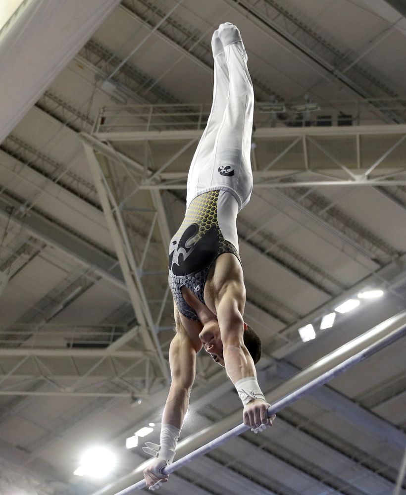 Iowa’s Mitch Mandozzi competes on the high bar against UIC and Minnesota Saturday, February 1, 2020 at Carver-Hawkeye Arena. (Brian Ray/hawkeyesports.com)
