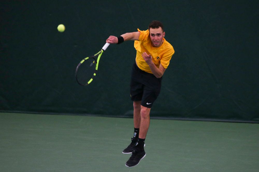 Iowa's Kareem Allaf at a tennis match vs Drake Friday, March 8, 2019 at the Hawkeye Tennis and Recreation Complex. (Lily Smith/hawkeyesports.com)