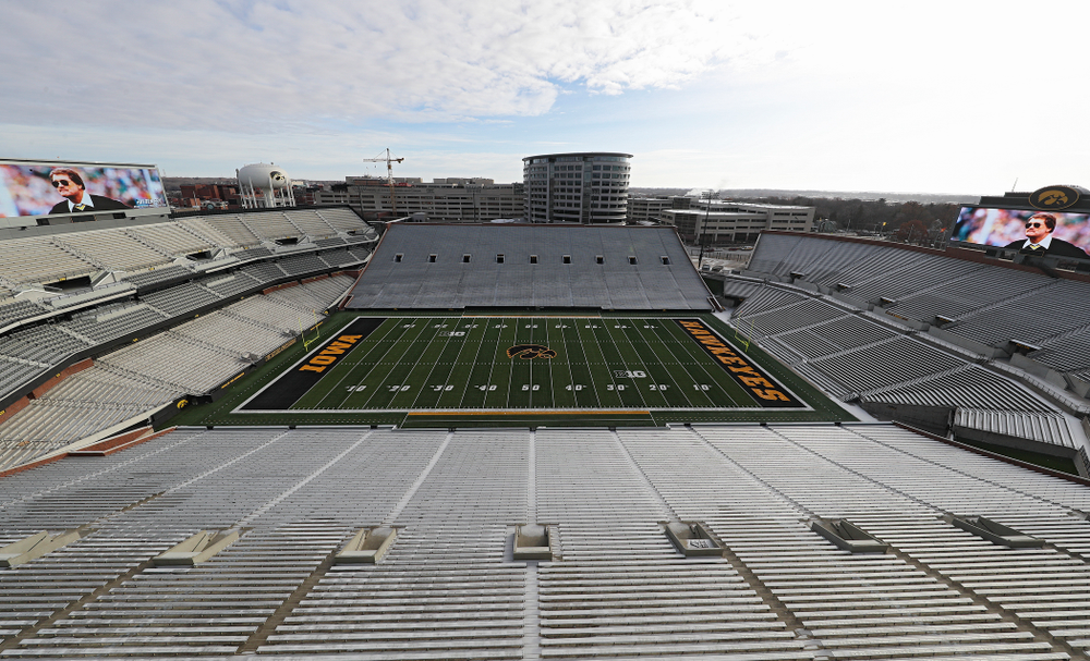 A picture of Hayden Fry is shown on the video boards at Kinnick Stadium in Iowa City on Wednesday, December 18, 2019. Hayden Fry passed away on Dec. 17, at the age of 90. (Stephen Mally/hawkeyesports.com)