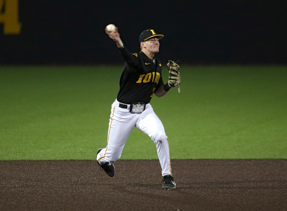 Iowa infielder Brendan Sher (2) throws to first for an out during the seventh inning of their game at Duane Banks Field in Iowa City on Tuesday, March 3, 2020. (Stephen Mally/hawkeyesports.com)