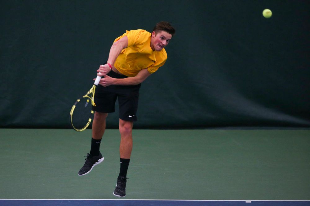 Iowa's Piotr Smietana at a tennis match vs Drake Friday, March 8, 2019 at the Hawkeye Tennis and Recreation Complex. (Lily Smith/hawkeyesports.com)