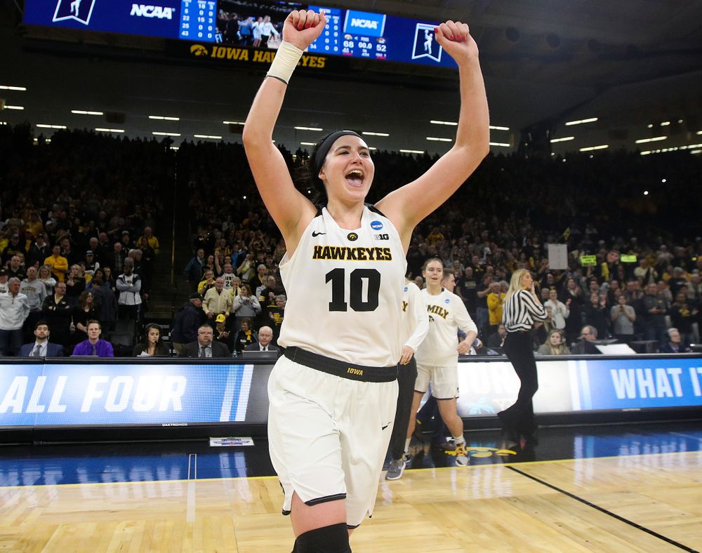Iowa Hawkeyes center Megan Gustafson (10) runs to center court after winning their second round game in the 2019 NCAA Women's Basketball Tournament at Carver Hawkeye Arena in Iowa City on Sunday, Mar. 24, 2019. (Stephen Mally for hawkeyesports.com)
