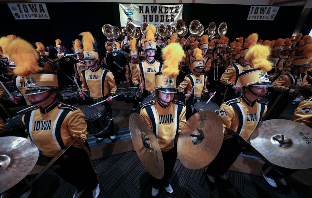 The Hawkeye Marching Band and the Iowa Spirit Squads perform during the Holiday Bowl Hawkeye Huddle Thursday, December 26, 2019 at the Hilton in downtown San Diego. (Brian Ray/hawkeyesports.com)