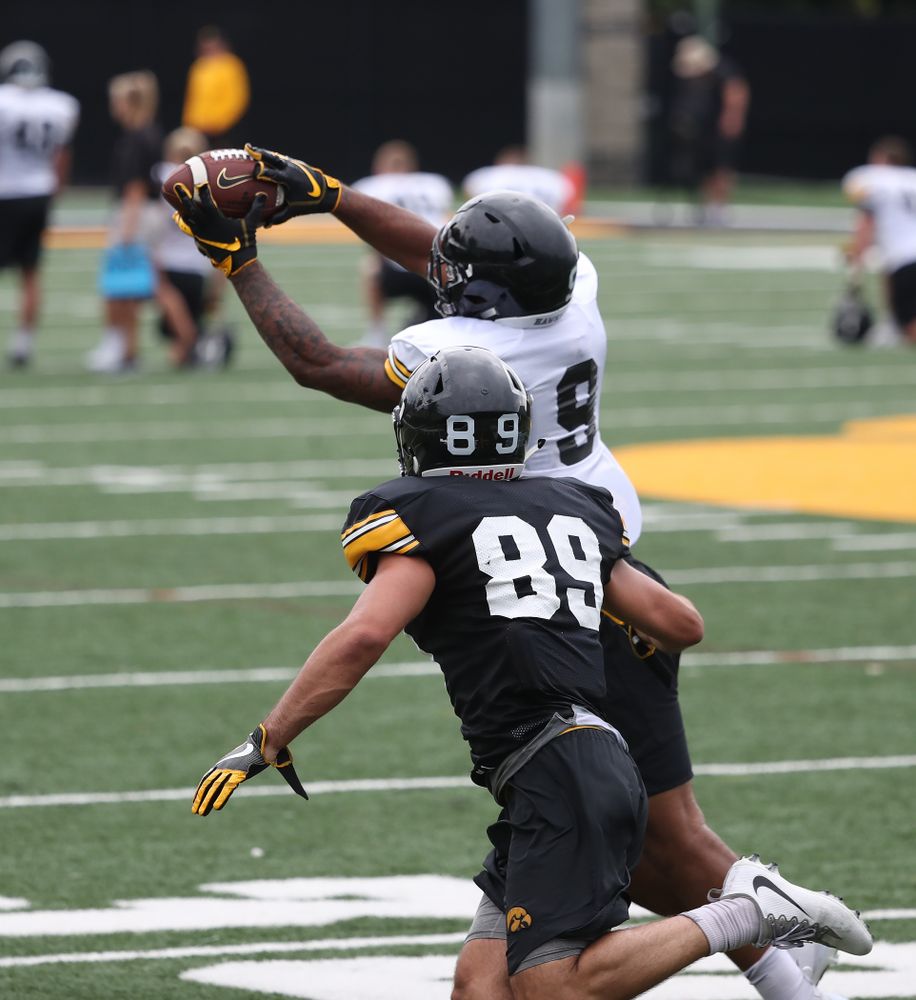 Iowa Hawkeyes defensive back Geno Stone (9) and wide receiver Nico Ragaini (89) during practice No. 4 of Fall Camp Monday, August 6, 2018 at the Hansen Football Performance Center. (Brian Ray/hawkeyesports.com)