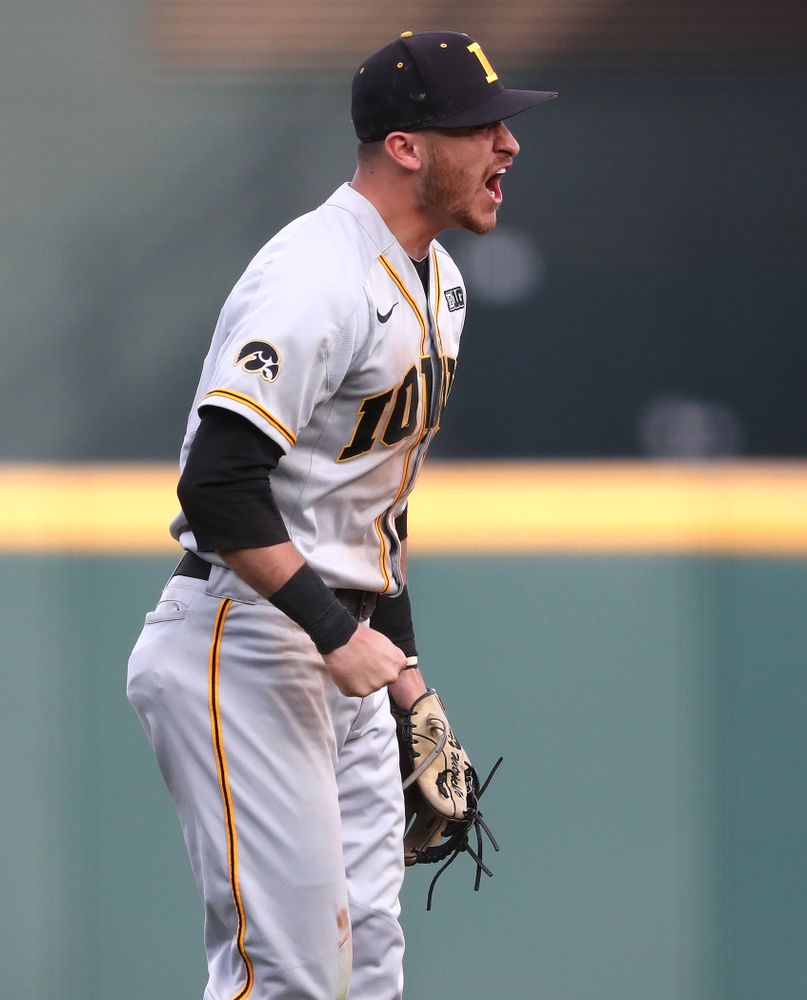 Iowa Hawkeyes Tanner Wetrich (16) celebrates after tuning a double play against the Indiana Hoosiers in the first round of the Big Ten Baseball Tournament Wednesday, May 22, 2019 at TD Ameritrade Park in Omaha, Neb. (Brian Ray/hawkeyesports.com)