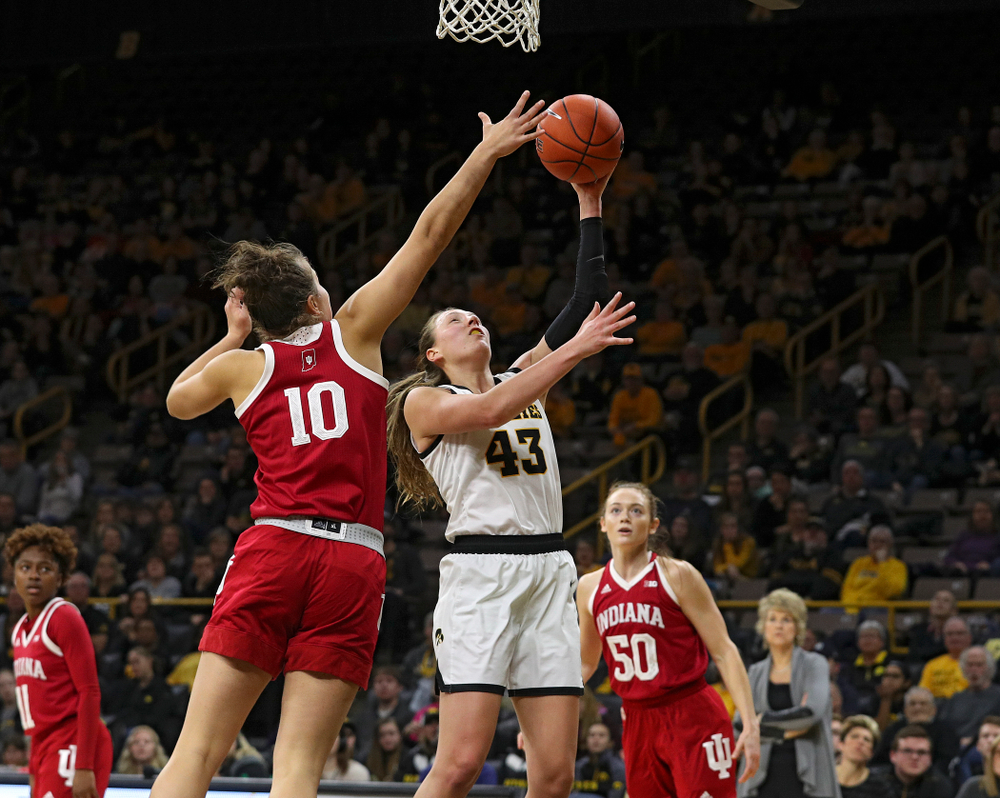 Iowa Hawkeyes forward Amanda Ollinger (43) makes a basket during the third quarter of their game at Carver-Hawkeye Arena in Iowa City on Sunday, January 12, 2020. (Stephen Mally/hawkeyesports.com)