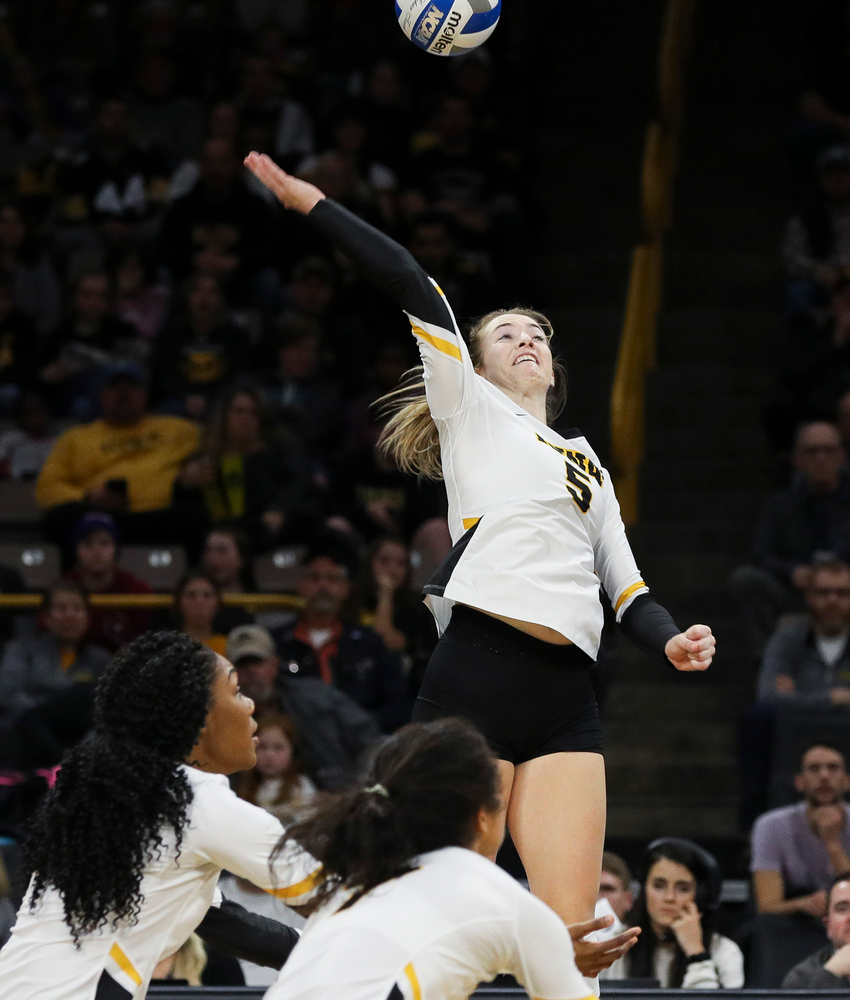 Iowa Hawkeyes outside hitter Meghan Buzzerio (5) spikes the ball during a match against Maryland at Carver-Hawkeye Arena on November 23, 2018. (Tork Mason/hawkeyesports.com)