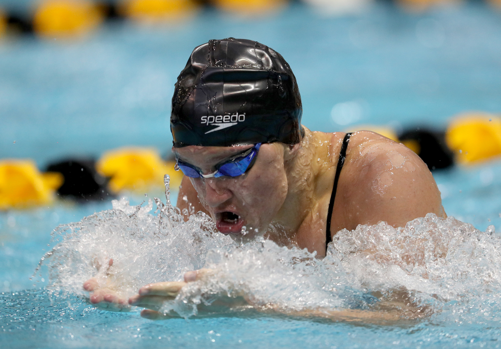 IowaÕs Sage Ohlensehlen competes in the 100 yard breaststroke against Notre Dame and Illinois Saturday, January 11, 2020 at the Campus Recreation and Wellness Center. (Brian Ray/hawkeyesports.com)