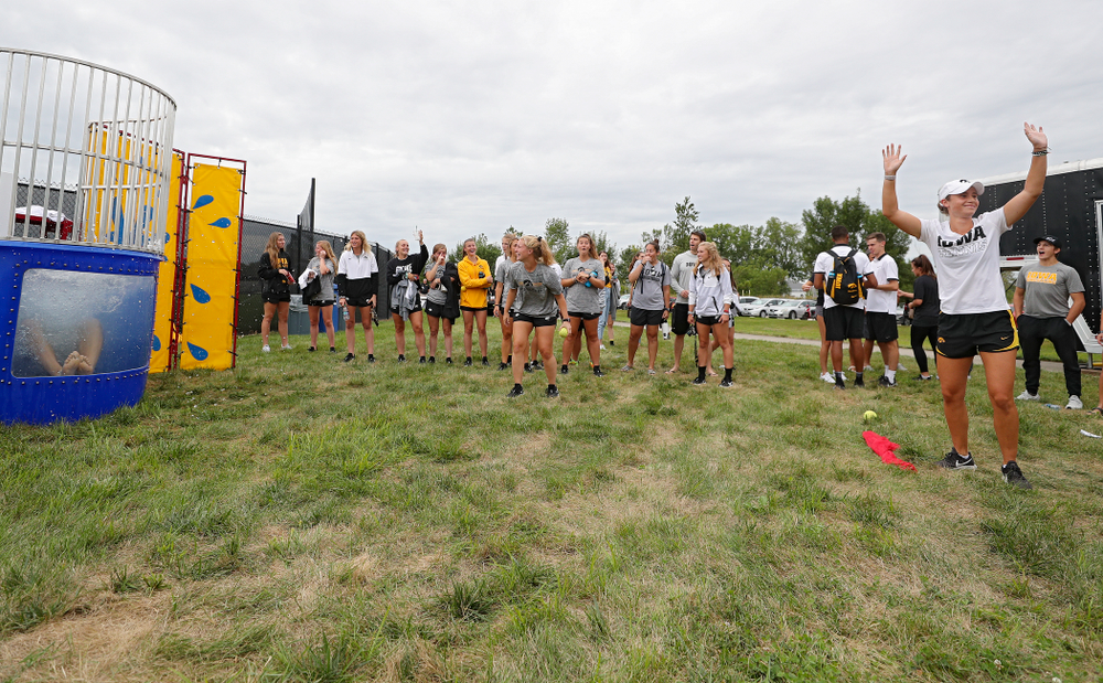 Iowa Women’s Tennis’ Elise van Heuvelen Treadwell reacts after sinking Women’s Tennis program coordinator Daniel Leitner in the dunk tank during the Student-Athlete Kickoff outside the Karro Athletics Hall of Fame Building in Iowa City on Sunday, Aug 25, 2019. (Stephen Mally/hawkeyesports.com)