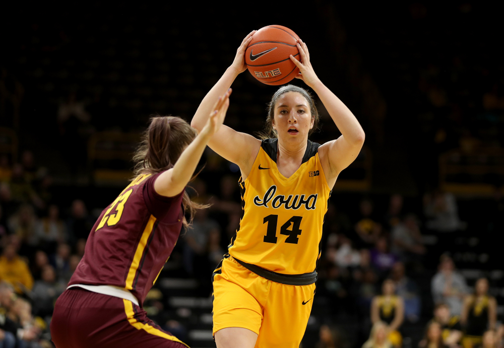Iowa Hawkeyes forward McKenna Warnock (14) against the Minnesota Golden Gophers Thursday, February 27, 2020 at Carver-Hawkeye Arena. (Brian Ray/hawkeyesports.com)
