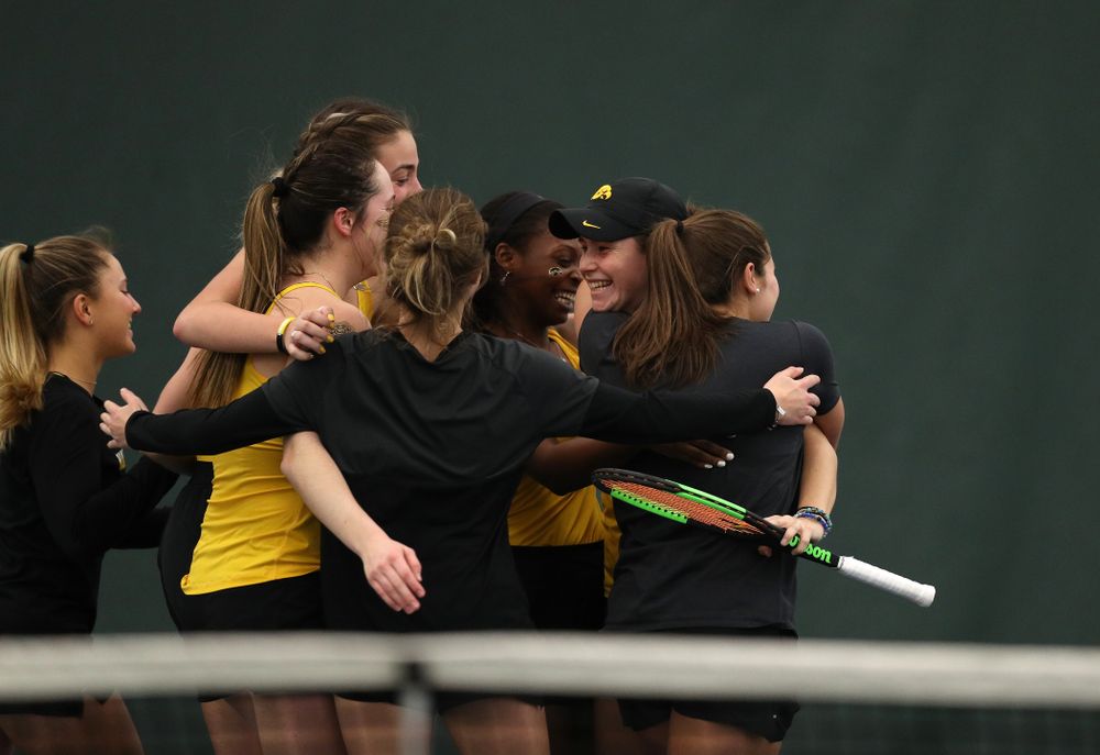 Iowa's Elise Van Heuvelen celebrates with her teammates following their 4-1 win over the Iowa State Cyclones Friday, February 8, 2019 at the Hawkeye Tennis and Recreation Complex. (Brian Ray/hawkeyesports.com)