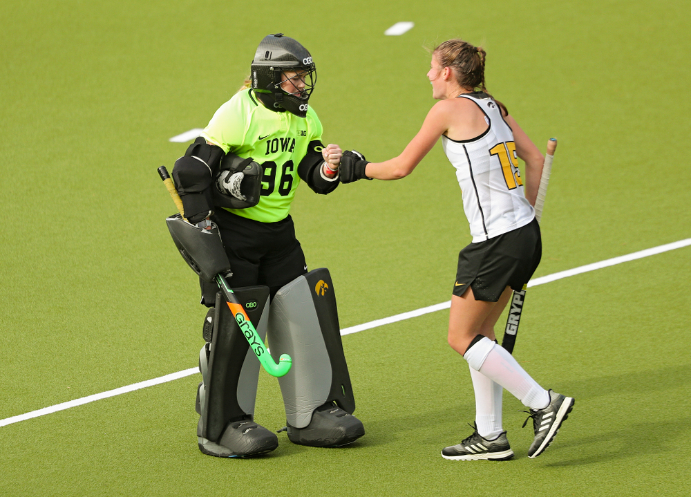 Iowa’s Leslie Speight (96) gives Esme Gibson (15) a fist bump during the third quarter of their NCAA Tournament Second Round match against North Carolina at Karen Shelton Stadium in Chapel Hill, N.C. on Sunday, Nov 17, 2019. (Stephen Mally/hawkeyesports.com)