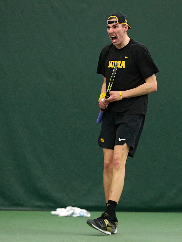 Iowa’s Nikita Snezhko celebrates a point during his singles match at the Hawkeye Tennis and Recreation Complex in Iowa City on Friday, March 6, 2020. (Stephen Mally/hawkeyesports.com)