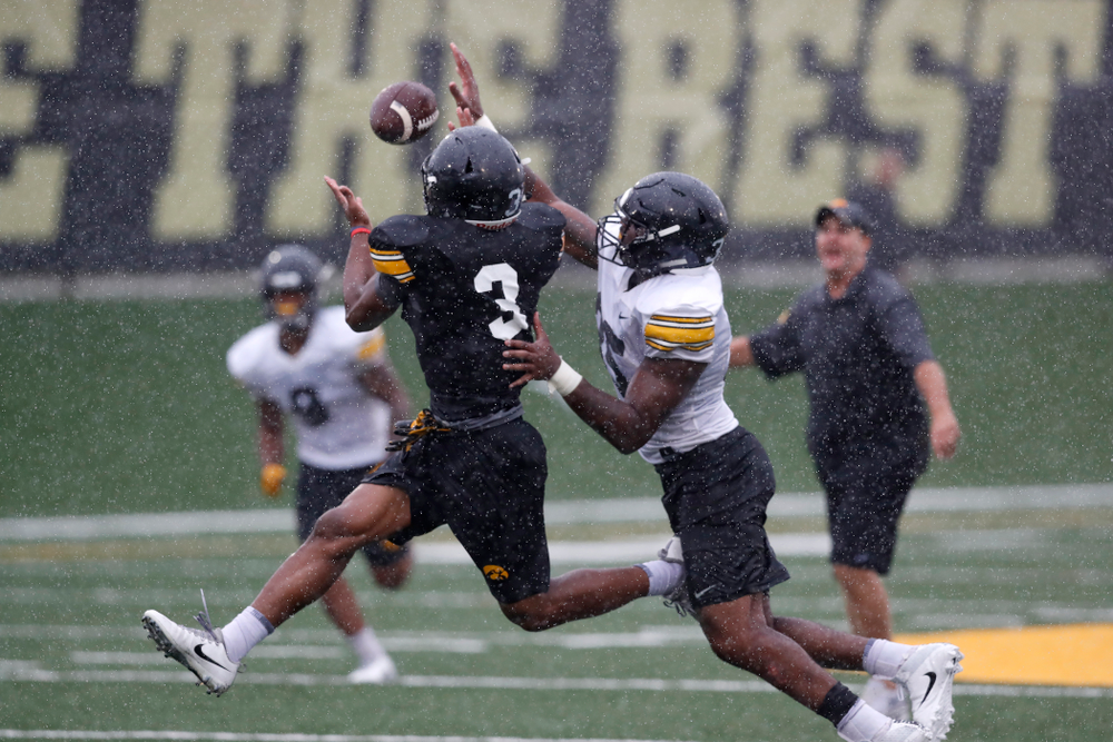 Iowa Hawkeyes wide receiver Tyrone Tracy Jr. (3) and linebacker Barrington Wade (35) during camp practice No. 15 Monday, August 20, 2018 at the Hansen Football Performance Center. (Brian Ray/hawkeyesports.com)