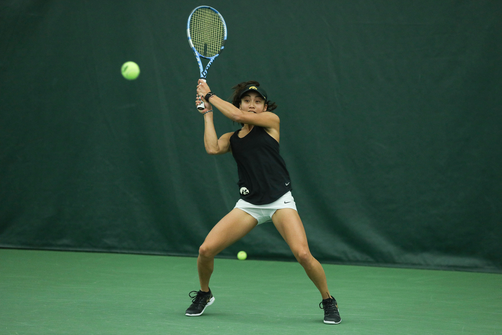 Iowa’s Michelle Bacalla returns a hit during the Iowa women’s tennis meet vs DePaul on Friday, February 21, 2020 at the Hawkeye Tennis and Recreation Complex. (Lily Smith/hawkeyesports.com)