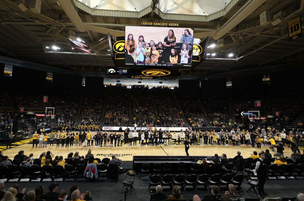 Female Athletes and participants in a youth clinic are recognized as part of National Girls and Women in Sports Day during the Iowa Hawkeyes game against Penn State Saturday, February 22, 2020 at Carver-Hawkeye Arena. (Brian Ray/hawkeyesports.com)