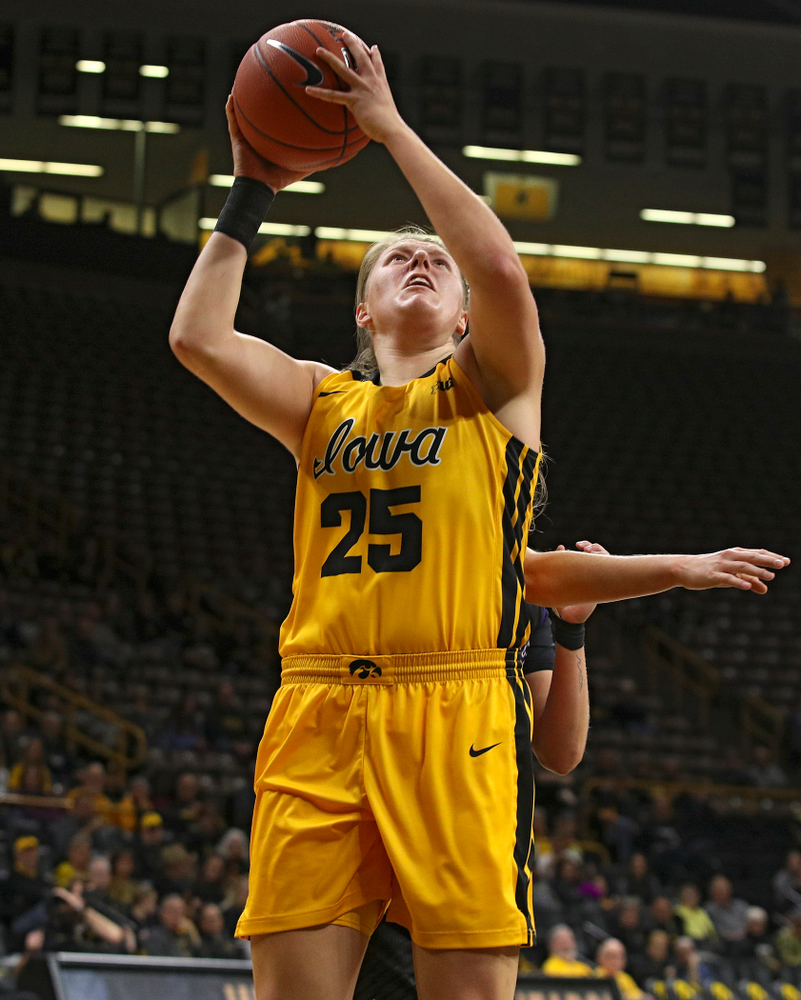 Iowa forward/center Monika Czinano (25) makes a basket during the third quarter of their game against Winona State at Carver-Hawkeye Arena in Iowa City on Sunday, Nov 3, 2019. (Stephen Mally/hawkeyesports.com)