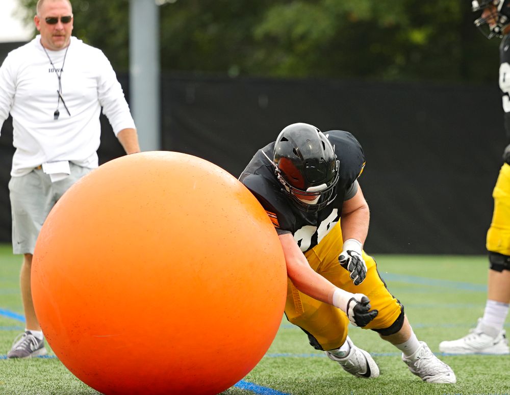 Iowa Hawkeyes offensive lineman Ezra Miller (76) runs a drill durning Fall Camp Practice No. 17 at the Hansen Football Performance Center in Iowa City on Wednesday, Aug 21, 2019. (Stephen Mally/hawkeyesports.com)