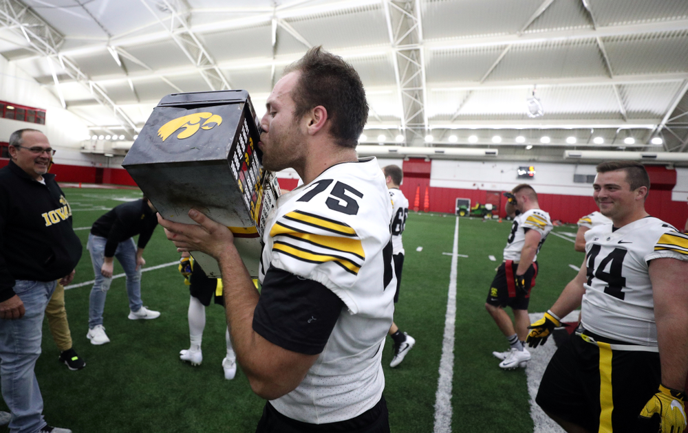 The Hawkeye football managers capture the rusty toolbox for the first time since 2008 with a 20-19 double The Hawkeye Football Managers captured the rusty toolbox for the first time since 2008 with a 20-19 double overtime win against the Wisconsin football managers on Nov. 8 in Madison, Wisconsin.