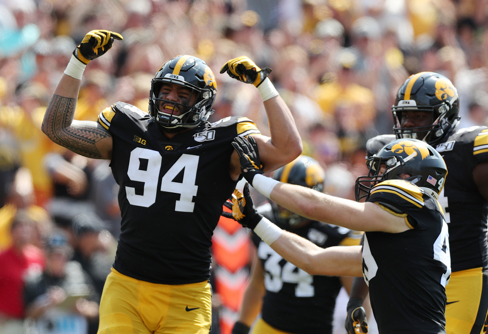 Iowa Hawkeyes defensive end A.J. Epenesa (94) celebrates a sack against the Rutgers Scarlet Knights Saturday, September 7, 2019 at Kinnick Stadium. (Brian Ray/hawkeyesports.com)