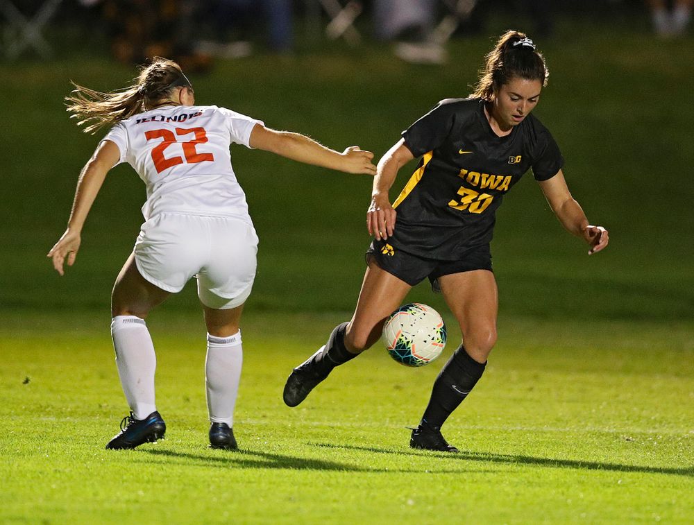 Iowa forward Devin Burns (30) gets around a defender during the first half of their match against Illinois at the Iowa Soccer Complex in Iowa City on Thursday, Sep 26, 2019. (Stephen Mally/hawkeyesports.com)