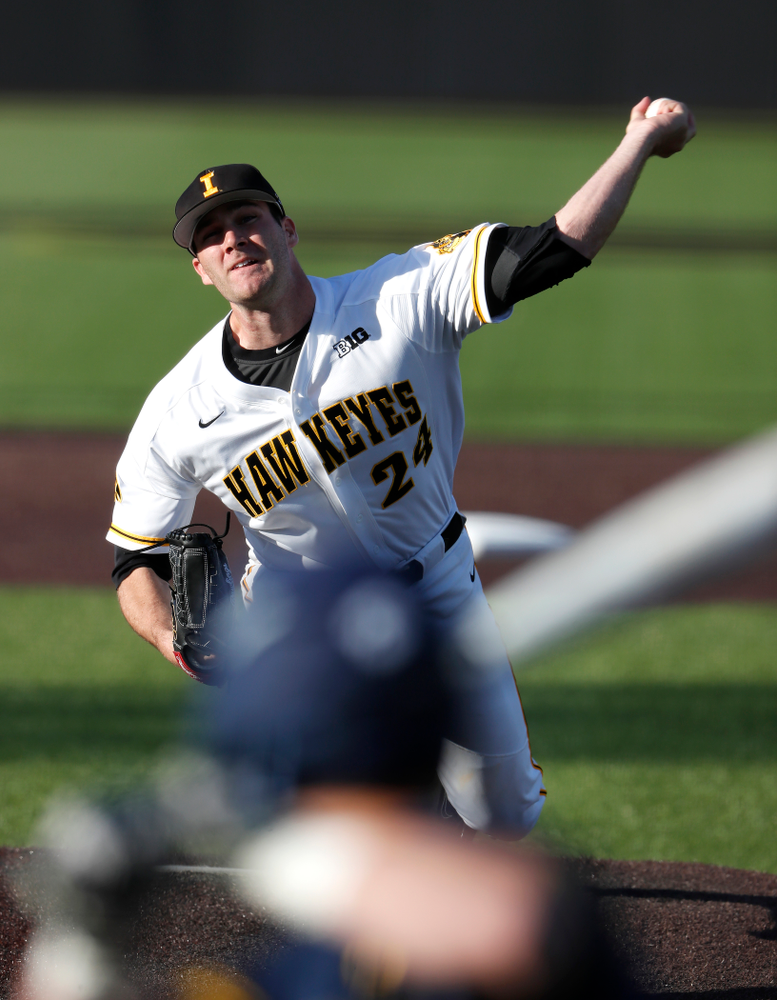 Iowa Hawkeyes pitcher Nick Allgeyer (24) delivers the ball to the plate against the Michigan Wolverines Friday, April 27, 2018 at Duane Banks Field in Iowa City. (Brian Ray/hawkeyesports.com)