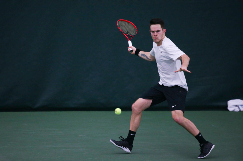 Iowa's Jonas Larsen at a tennis match vs Drake Friday, March 8, 2019 at the Hawkeye Tennis and Recreation Complex. (Lily Smith/hawkeyesports.com)
