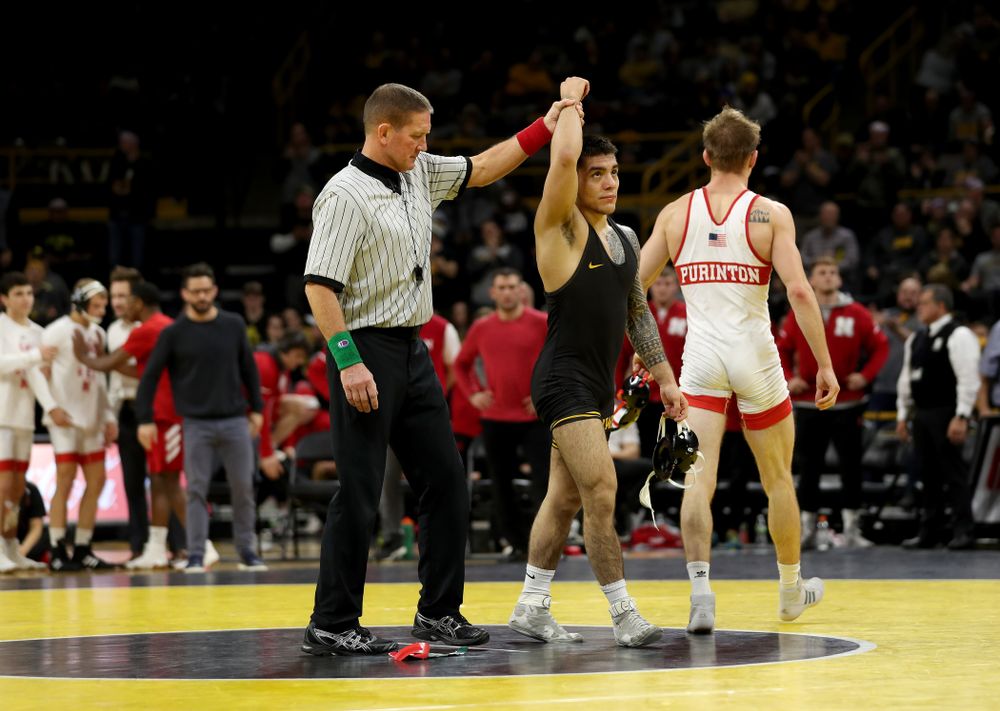 Iowa’s Pat Lugo wrestles Nebraska’s Collin Purinton at 149 pounds Saturday, January 18, 2020 at Carver-Hawkeye Arena. Lugo won the match 4-1. (Brian Ray/hawkeyesports.com)